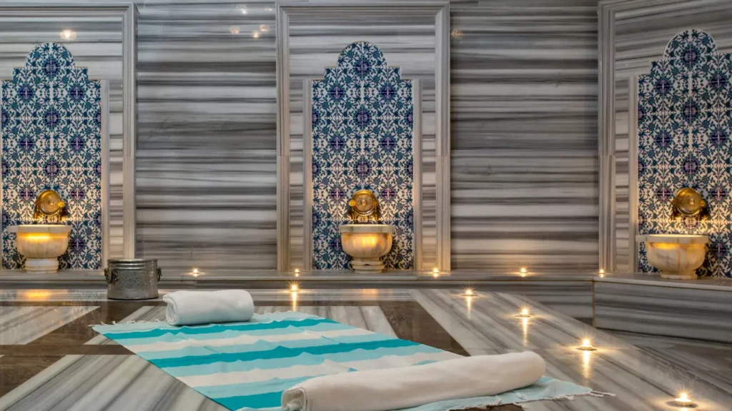 Traditional Turkish Hamam interior with marble and steam