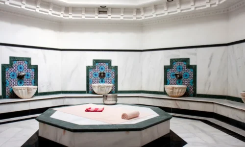 Candle-lit hammam setup for romantic experience