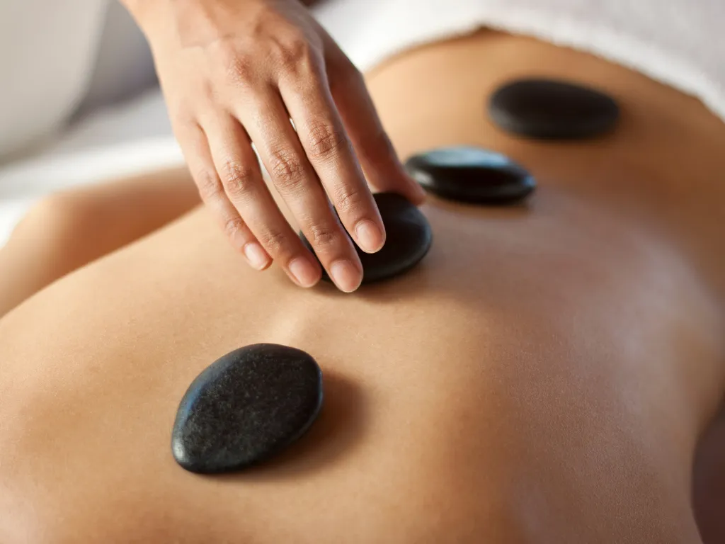 Spa room setup with candles and aromatherapy diffusers