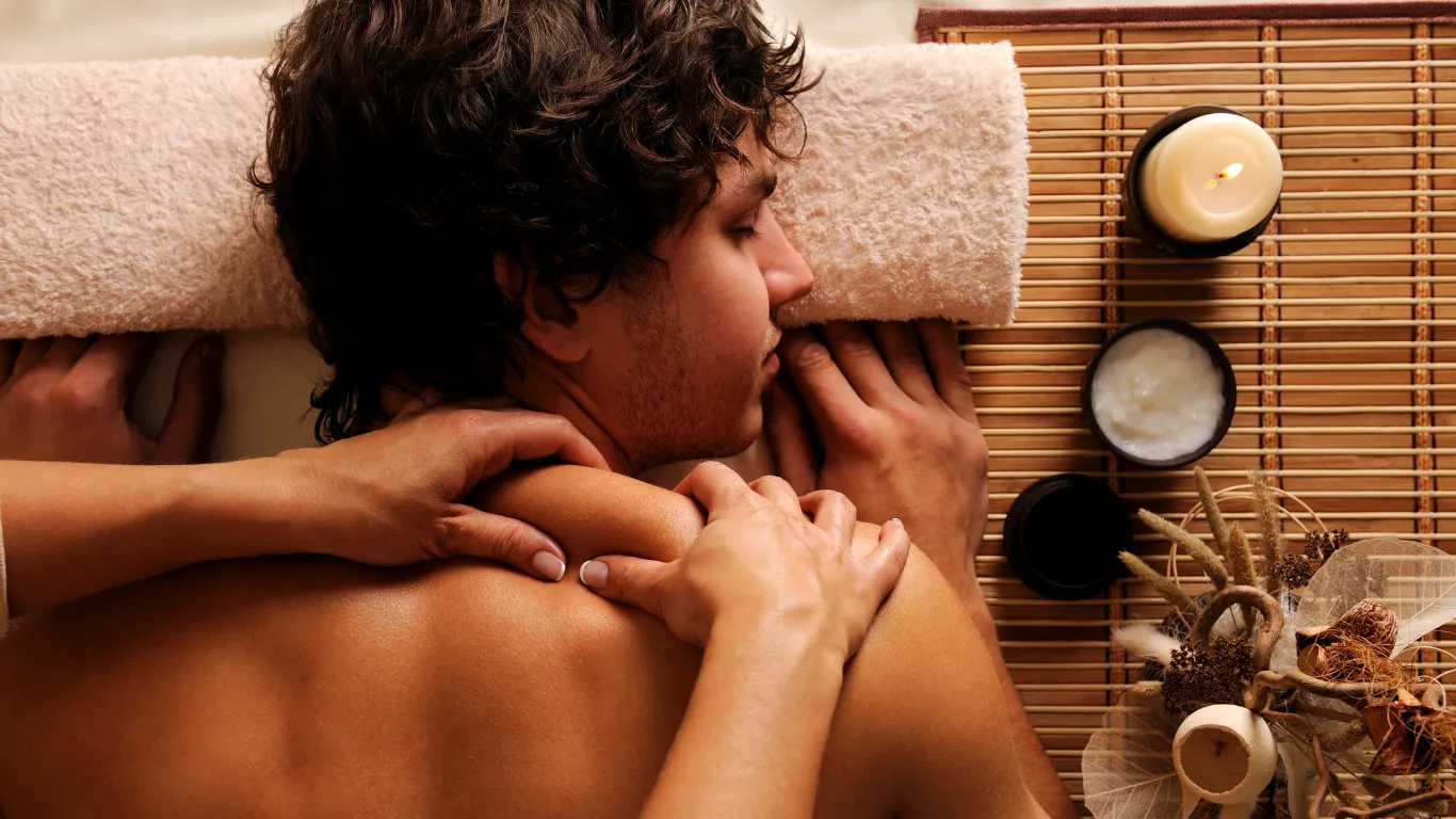 Couple enjoying side-by-side massage at Victory Spa
