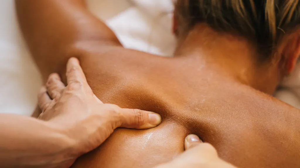 Couple receiving side-by-side aromatherapy massage