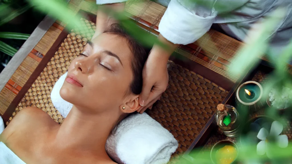 Therapist performing aromatherapy massage in Istanbul spa