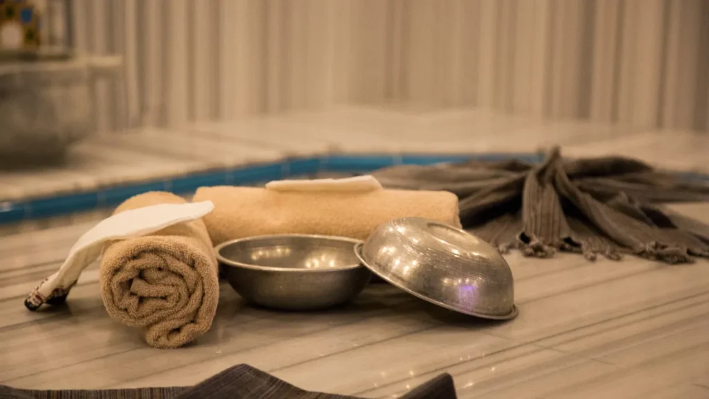 Couple relaxing in modern hammam lounge.