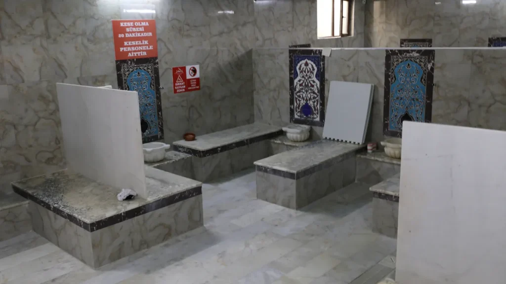 Couple relaxing in private hammam suite.