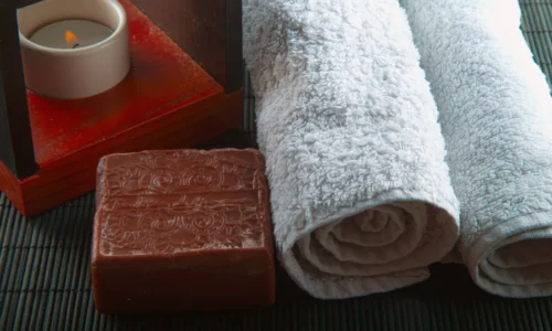 Couple enjoying a traditional Turkish hammam with foam massage.
