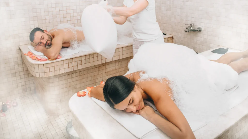 Couple enjoying affordable Turkish bath package.